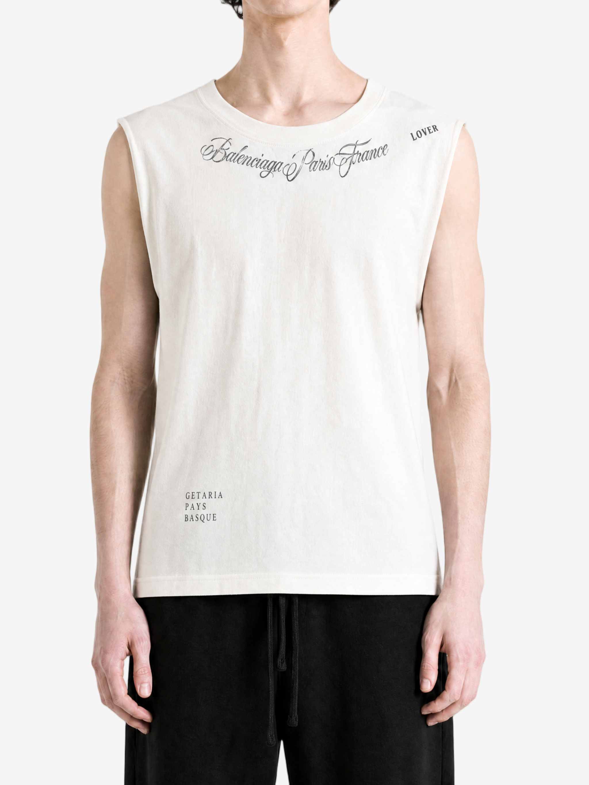 White t-shirt worn by a person, showing the t-shirt fit