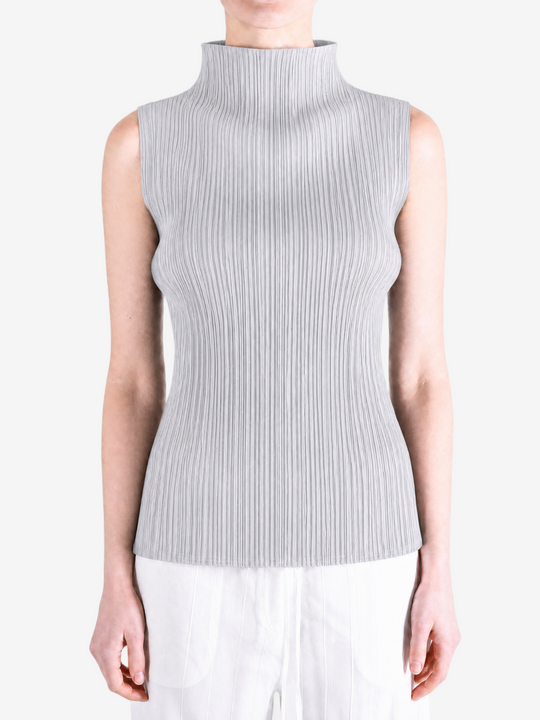 Grey shirt worn by a person, showing the shirt fit
