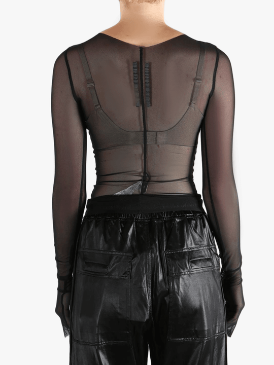Black top worn by a person, showing the top's fit