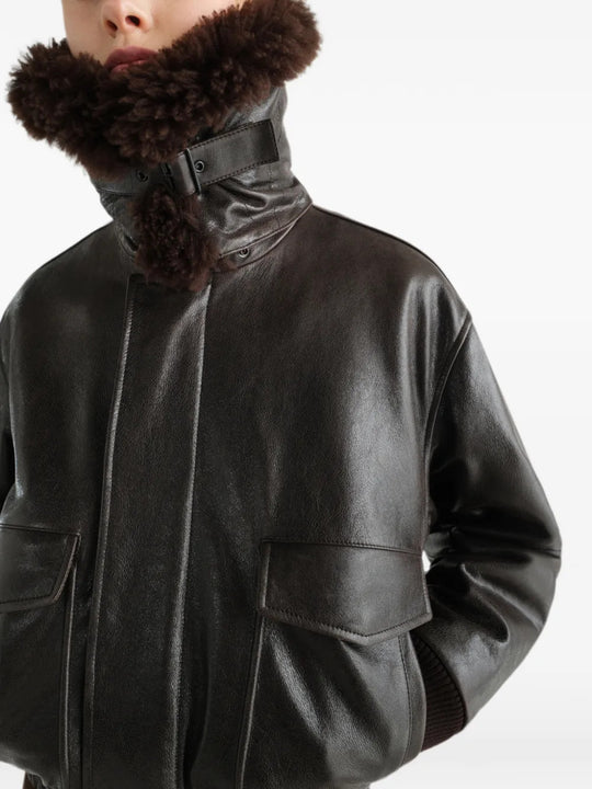 Black jacket worn by a person, showing the jacket fit