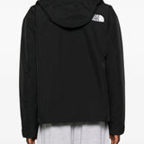 Black jackets worn by a person, showing the jackets fit