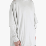 White sweats worn by a person, showing the sweats fit