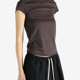 Brown shirt worn by a person, showing the shirt fit