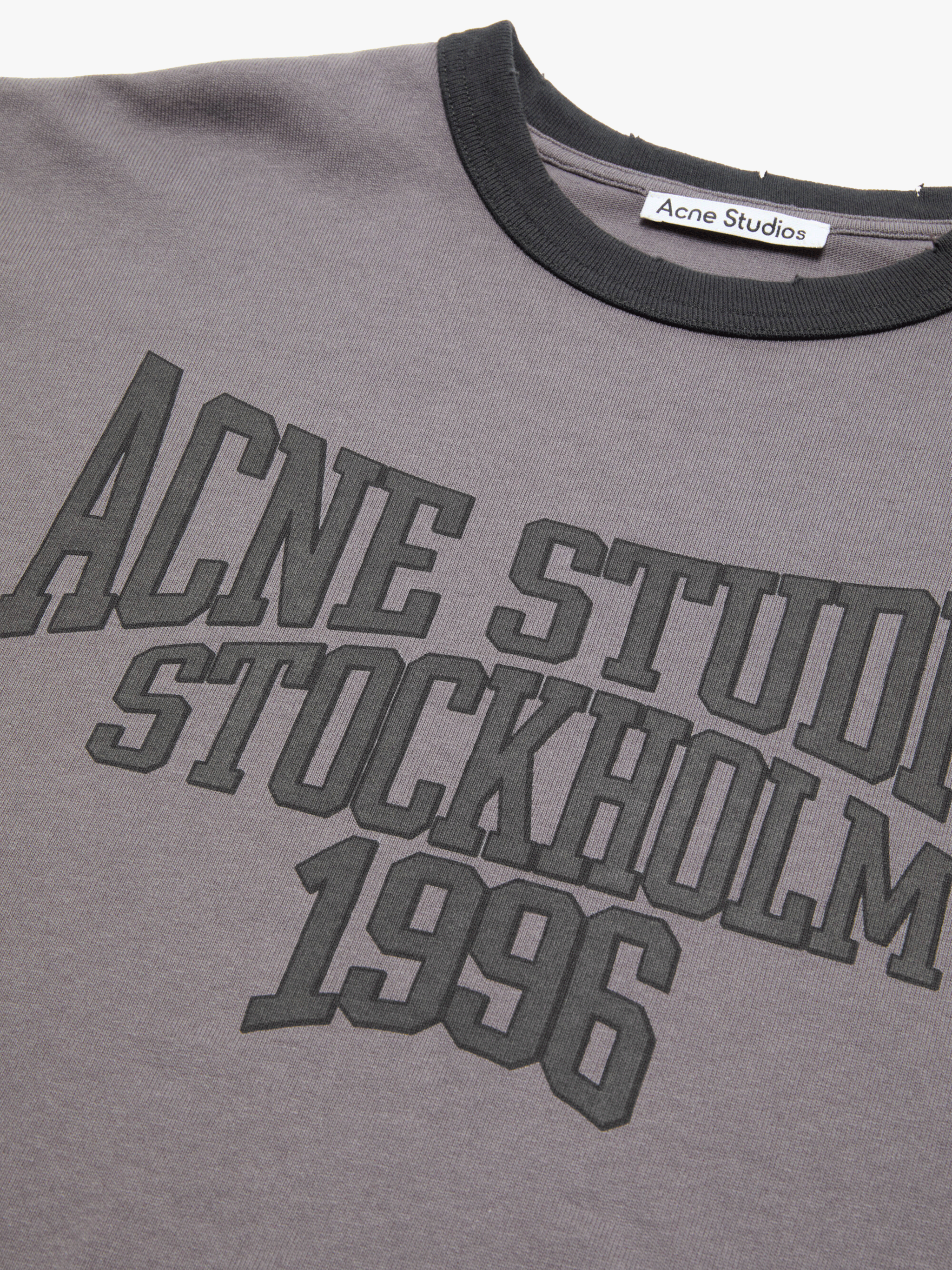 Close up of Grey t-shirt, showing texture of the 100% cotton fabric