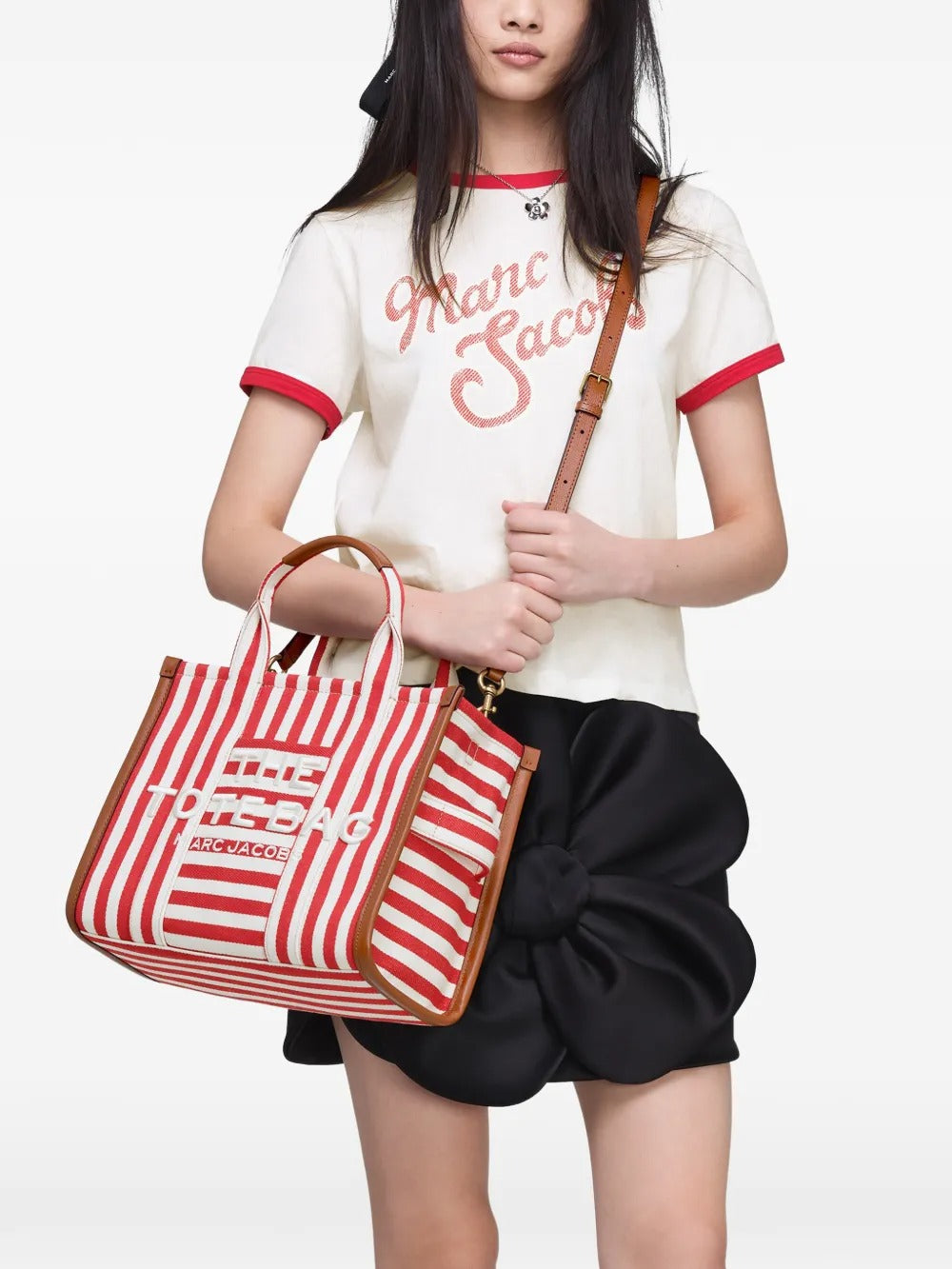 Red bag worn by a person, showing the bag's fit