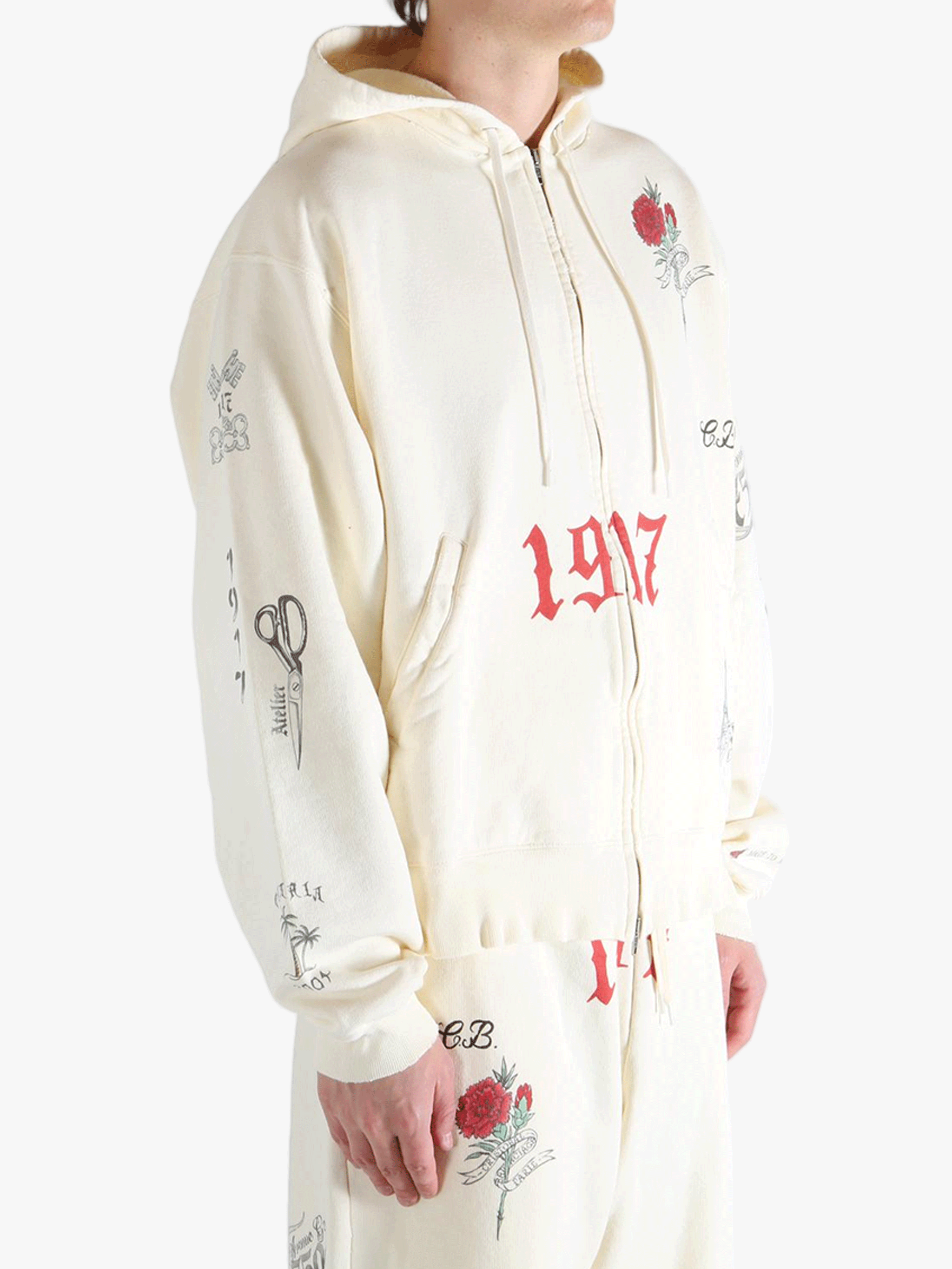 White hoodies worn by a person, showing the hoodies fit