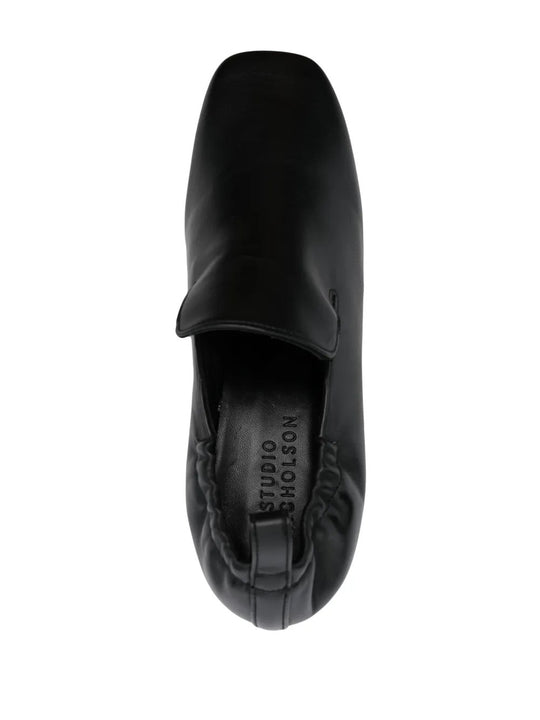 Black heels, side view