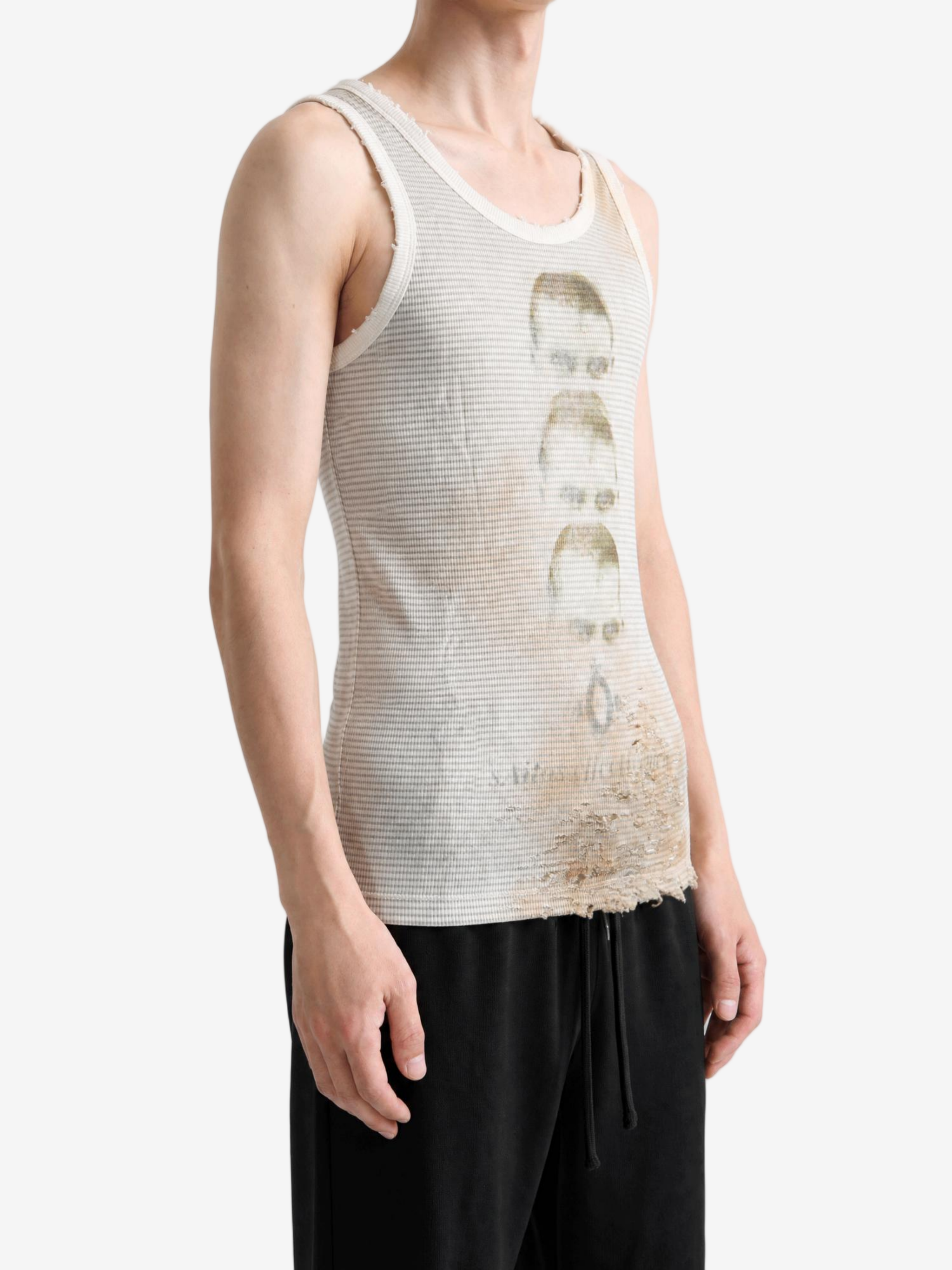 Tan t-shirt worn by a person, showing the t-shirt fit