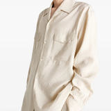 White shirts worn by a person, showing the shirts fit