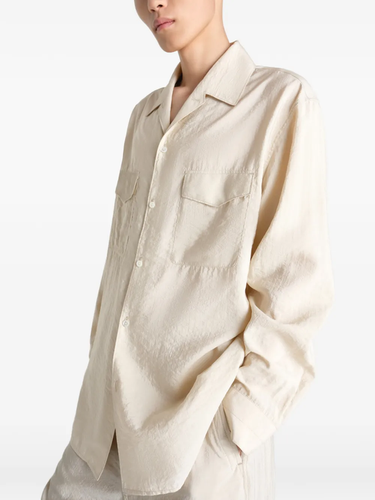 White shirts worn by a person, showing the shirts fit