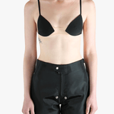 Black activewear worn by a person, showing the activewear's fit