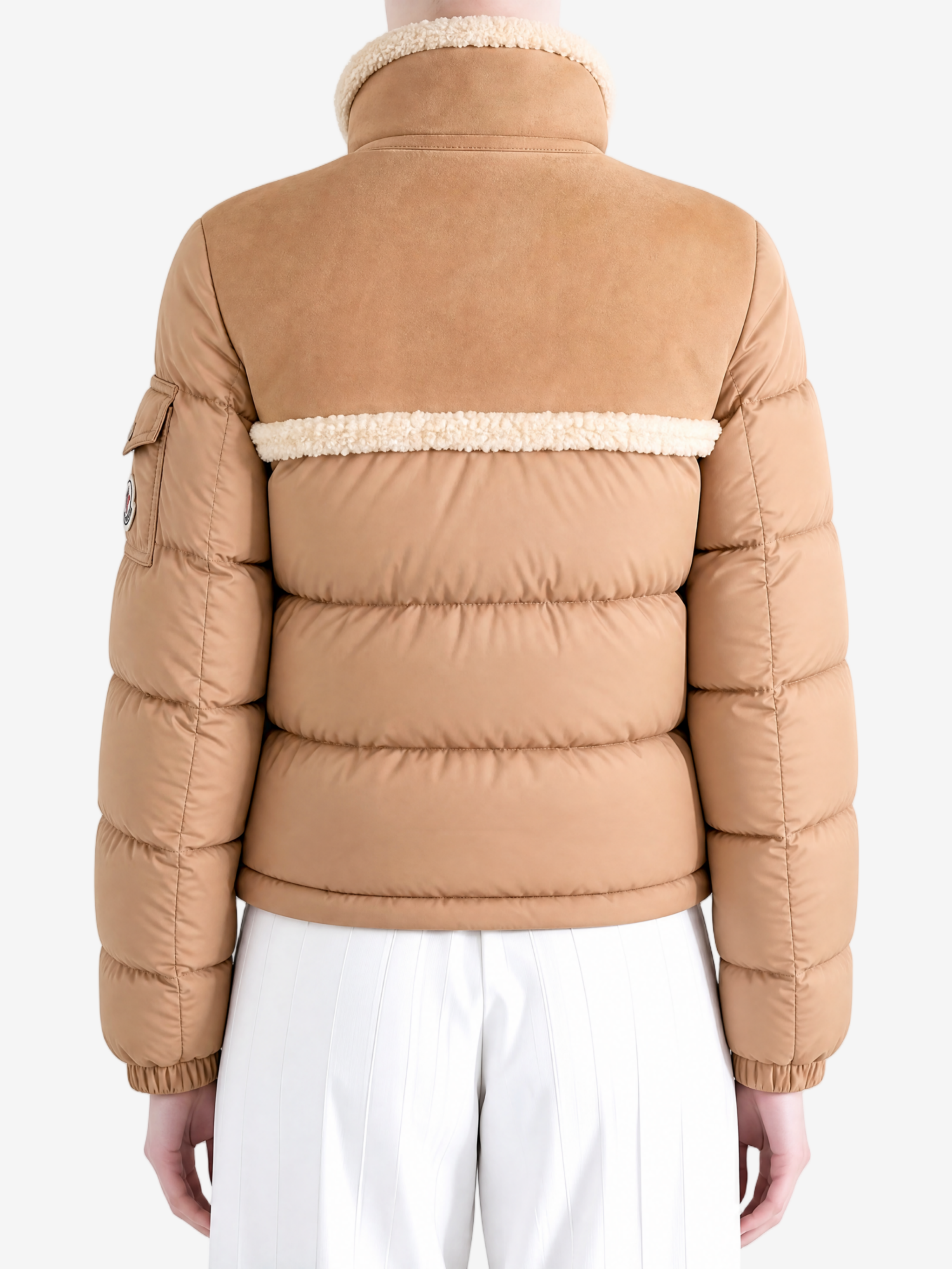 Brown jacket worn by a person, showing the jacket fit