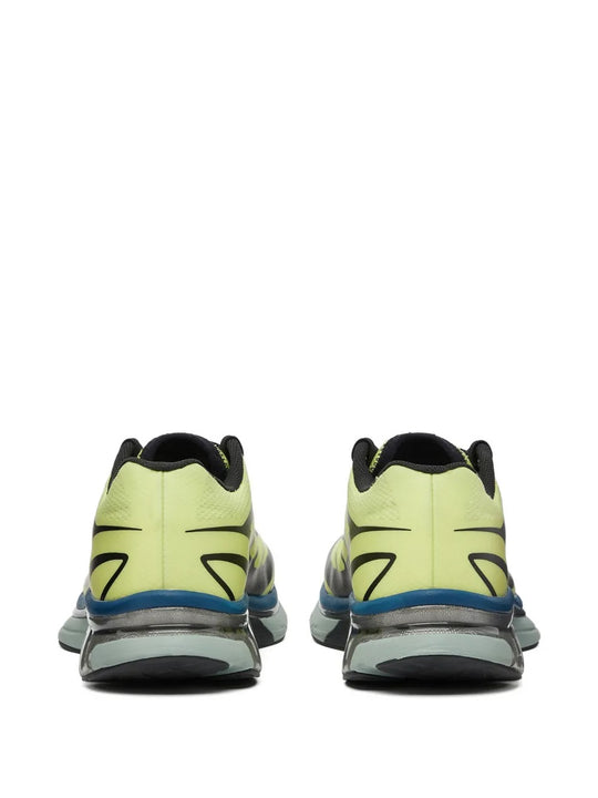 Yellow sneakers, back view