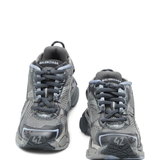 Grey sneakers, front view