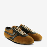 Tan sneakers, side view