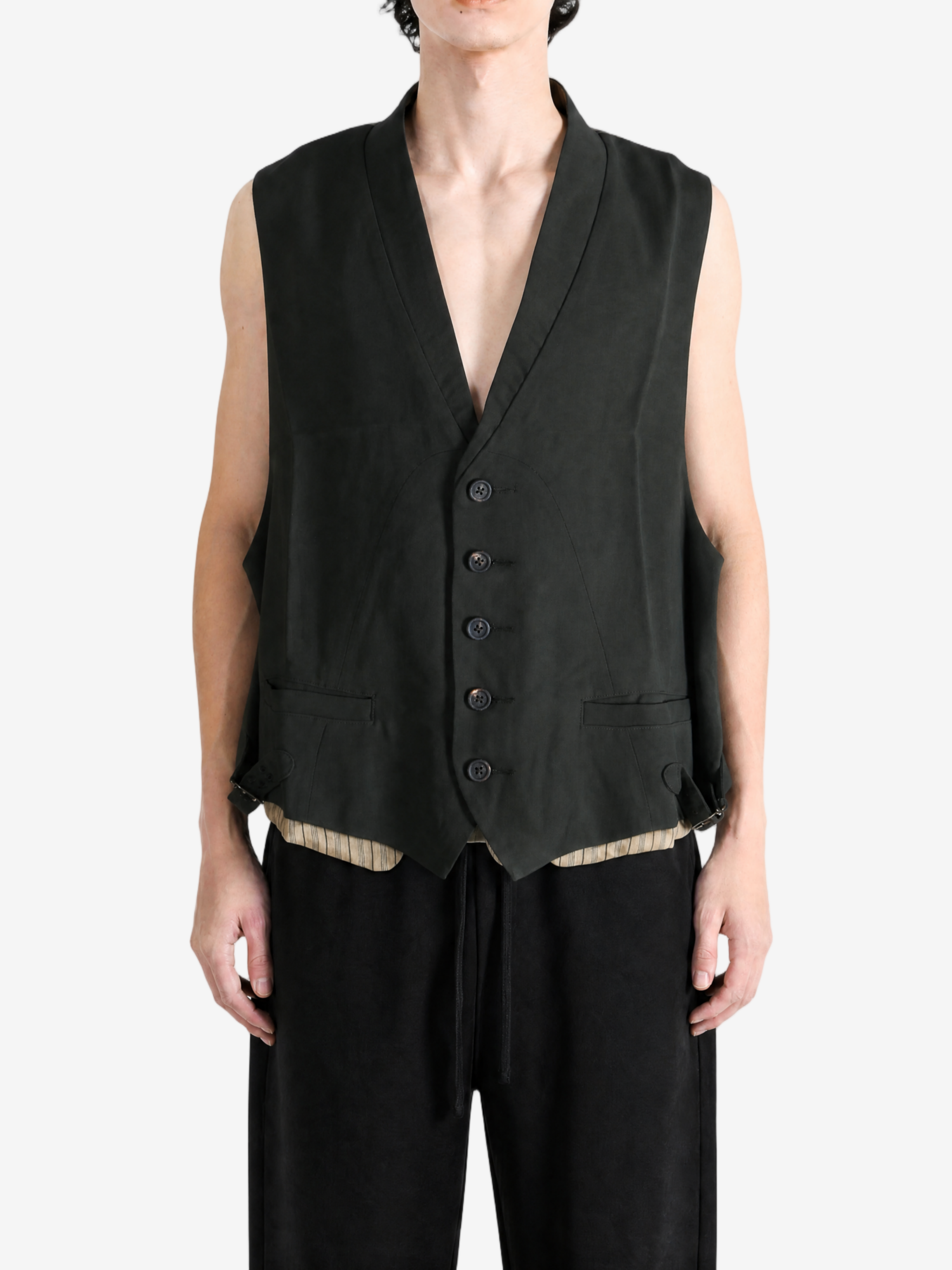 Black jacket worn by a person, showing the jacket fit