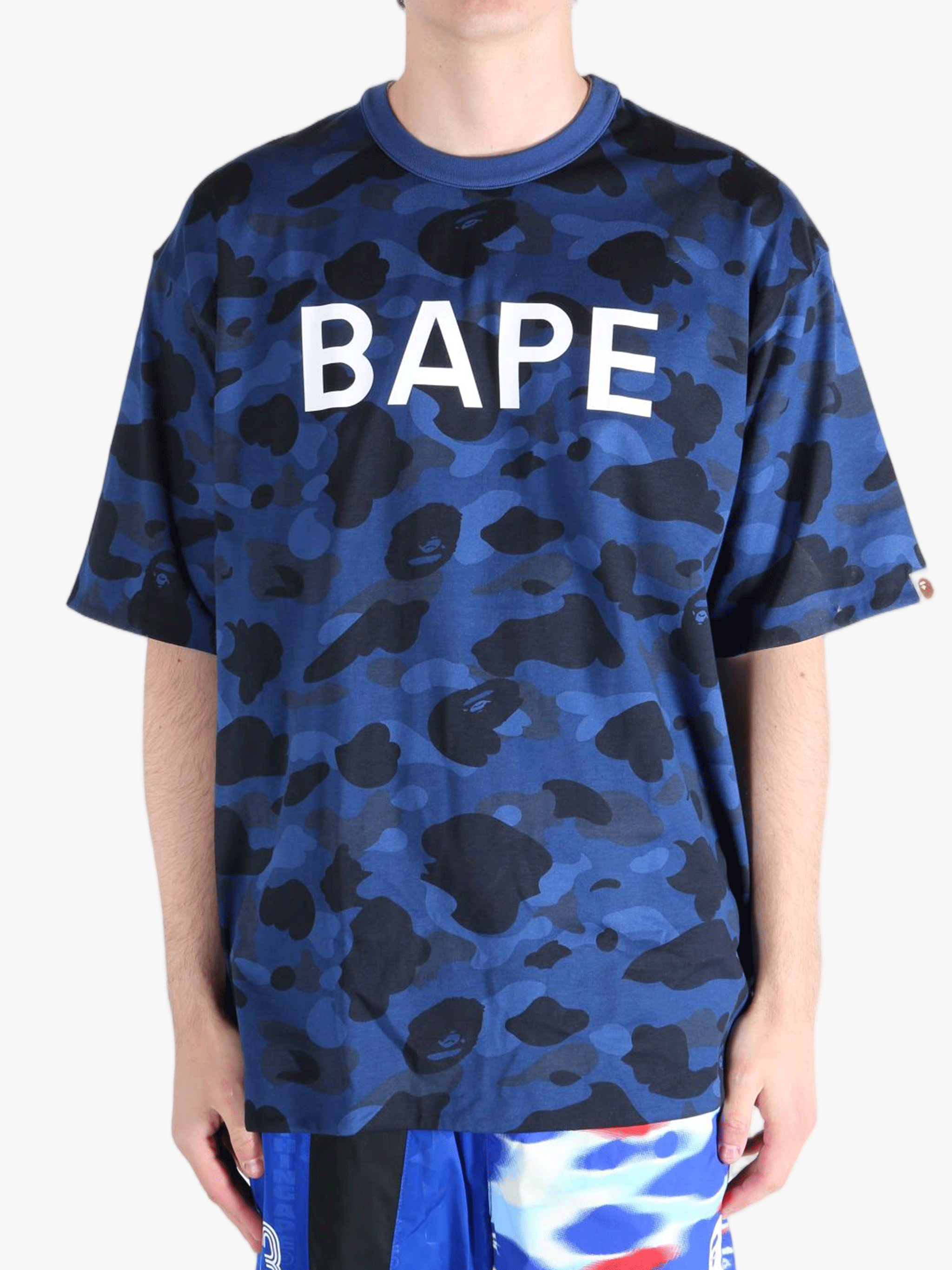 Blue t-shirt worn by a person, showing the shirt's fit