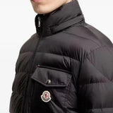 Black jacket worn by a person, showing the jacket fit