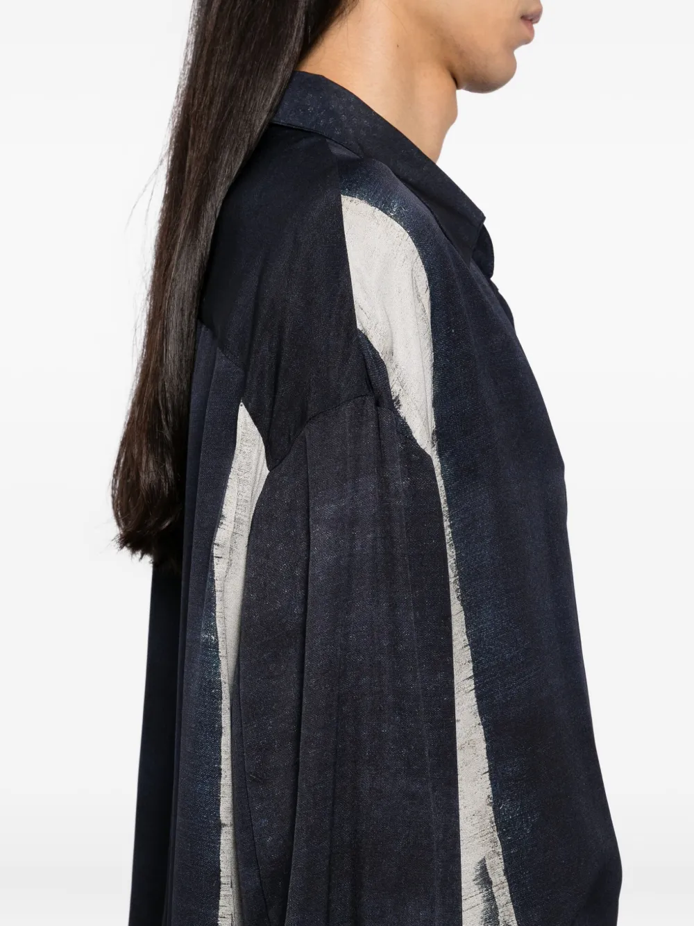 Close up of the blue shirt, showing texture of the silk fabric