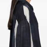 Close up of the blue shirt, showing texture of the silk fabric