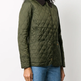 Green jackets,worn by a person, showing the jackets fit