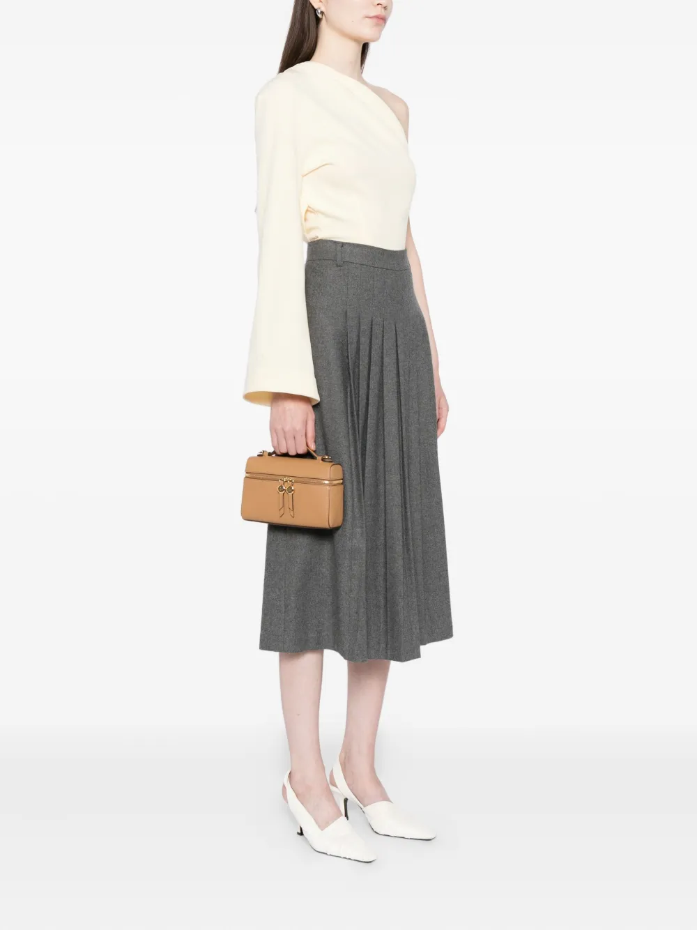 Tan bags worn by a person, showing the bags's fit