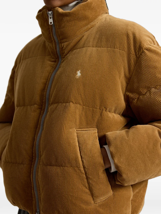 Tan jacket worn by a person, showing the jacket fit