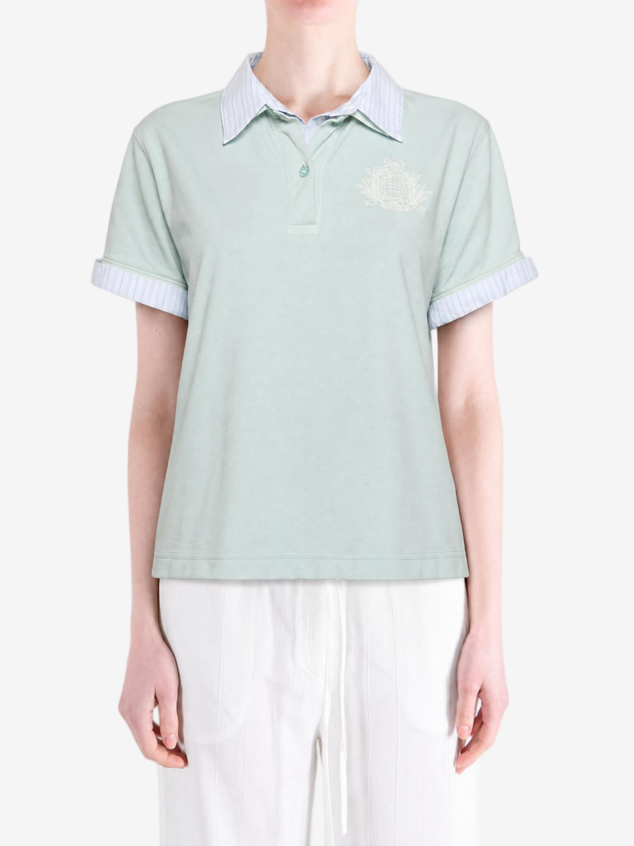 Green t-shirt worn by a person, showing the t-shirt fit
