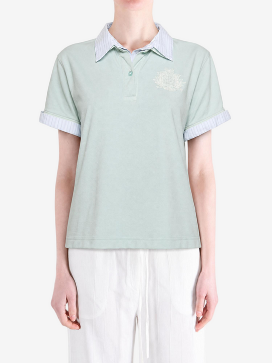 Green t-shirt worn by a person, showing the t-shirt fit