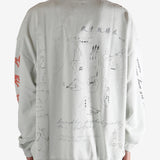 Grey top worn by a person, showing the top fit