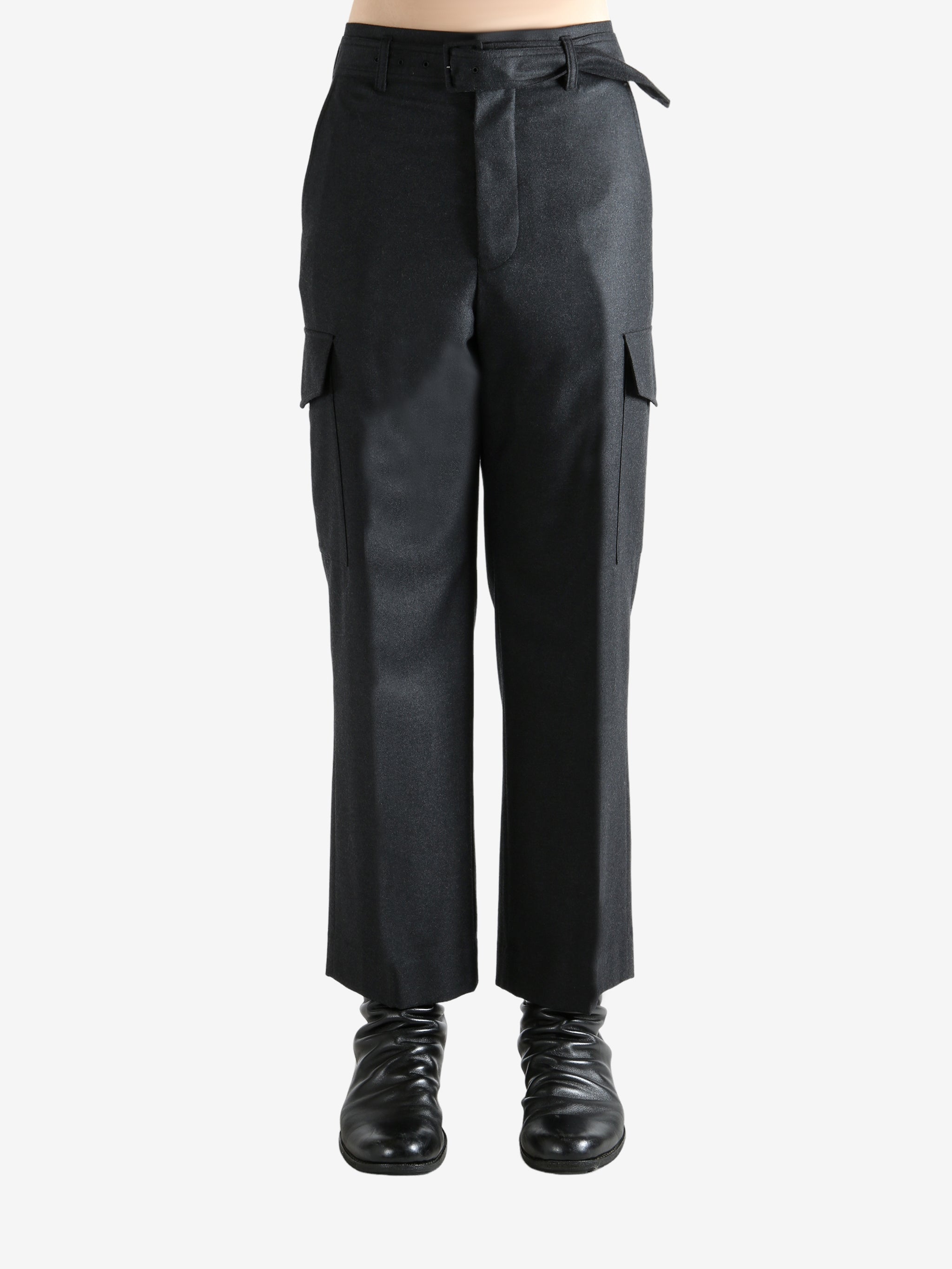 Black pant worn by a person, showing the pant's fit
