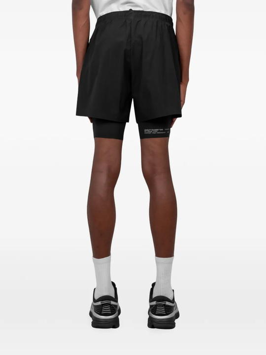 Black shorts, full body view