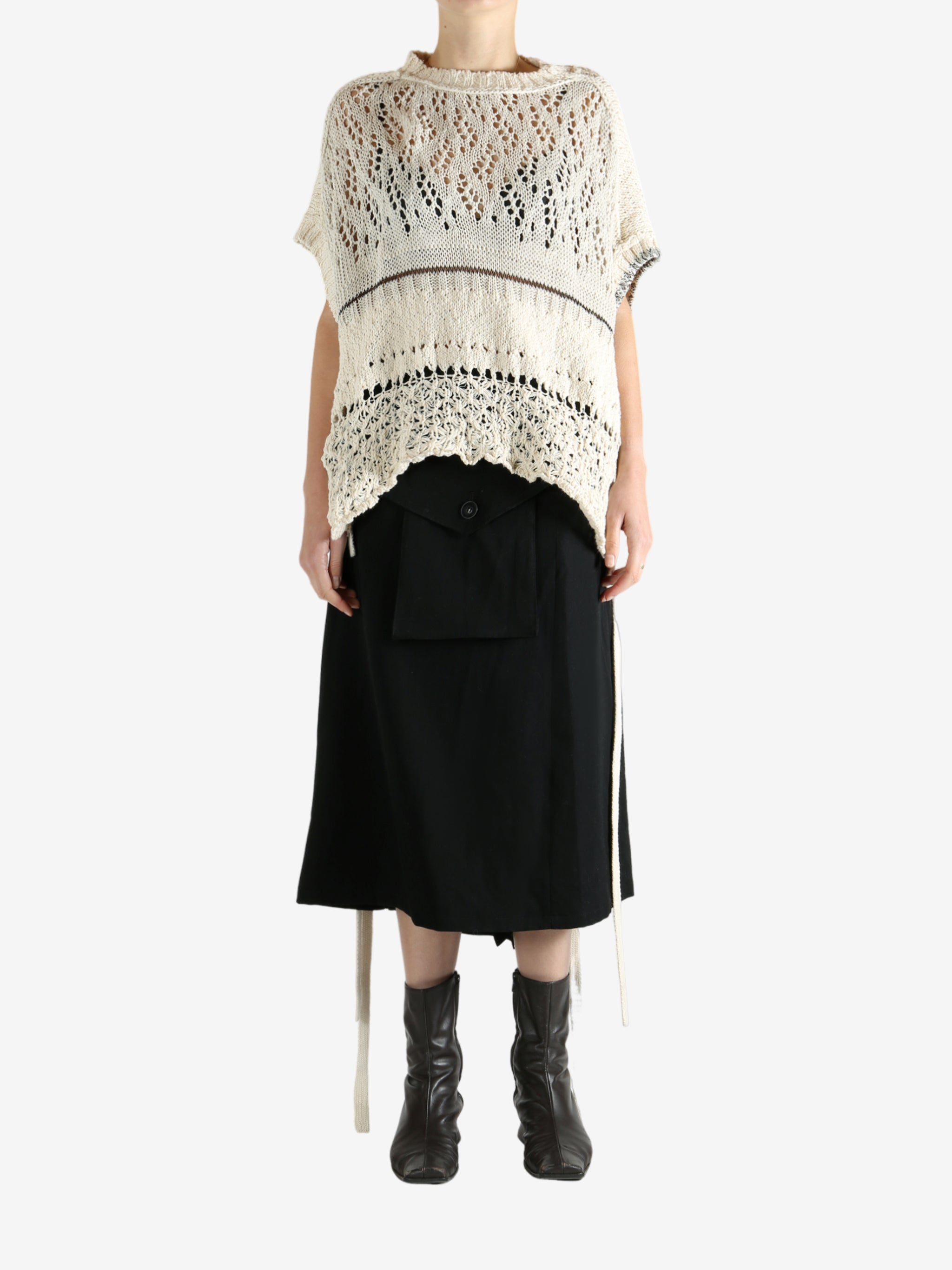 White vests worn by a person, showing the vests fit