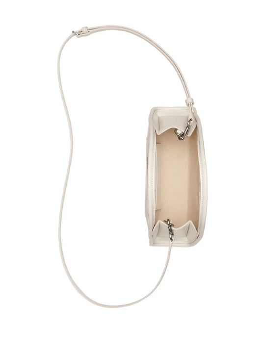 Close up of the white, showing texture of the leather fabric