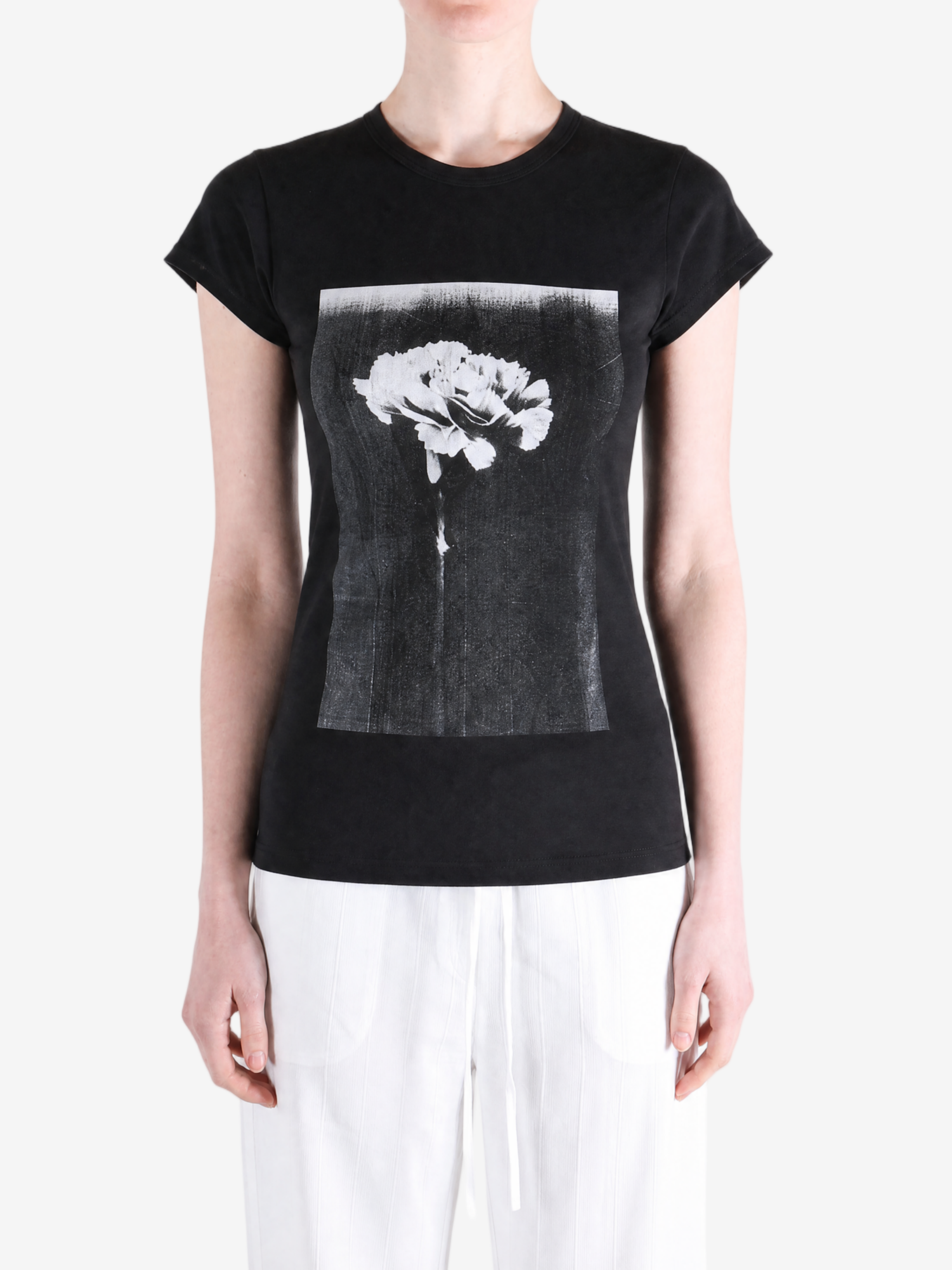 Black t-shirt worn by a person, showing the t-shirt fit