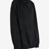 Black hoodie worn by a person, showing the hoodie fit
