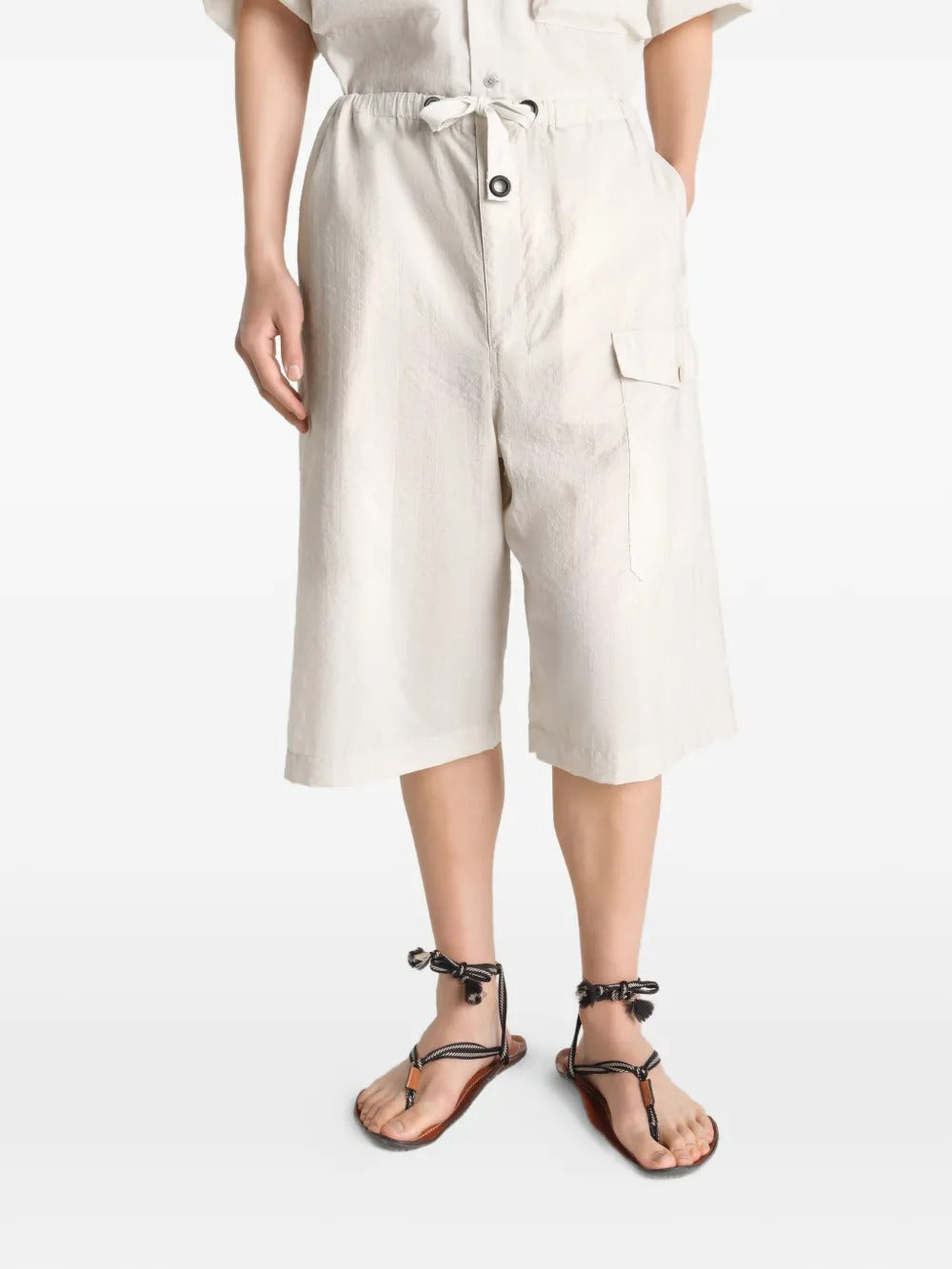 White short worn by a person, showing the short's fit