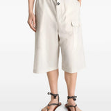 White short worn by a person, showing the short's fit