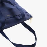 Close up of navy bag, showing texture of the Nylon fabric