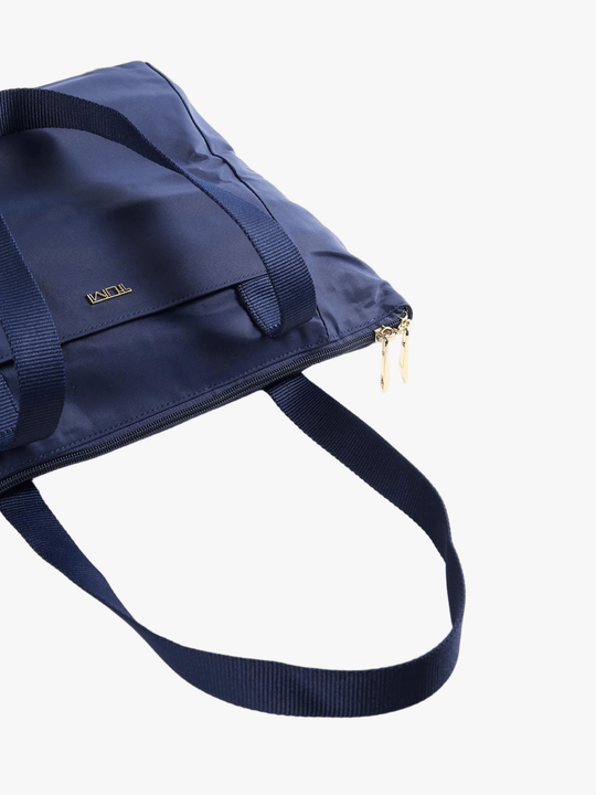 Close up of navy bag, showing texture of the Nylon fabric
