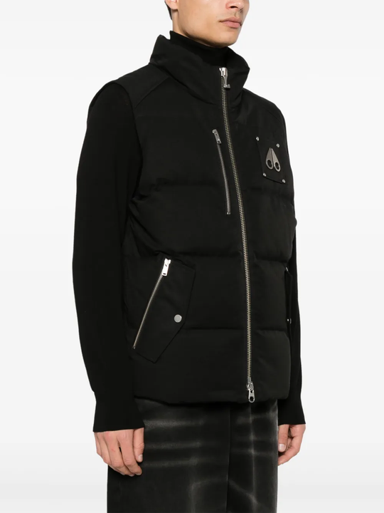 Black jacket worn by a person, showing the jacket fit