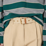 Close up of green t-shirt, showing texture of the cotton fabric