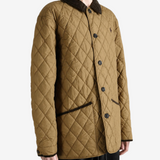 Tan jacket worn by a person, showing the jacket fit
