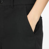 Black shorts worn by a person, showing the shorts fit