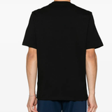 Black t-shirts worn by a person, showing the shirt's fit
