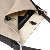 Close up of tan bag, showing texture of the calf leather fabric