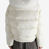 White jacket worn by a person, showing the jacket's fit