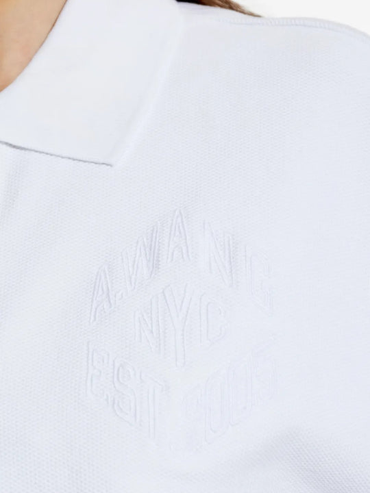 Close up of the white t-shirt, showing texture of the cotton fabric