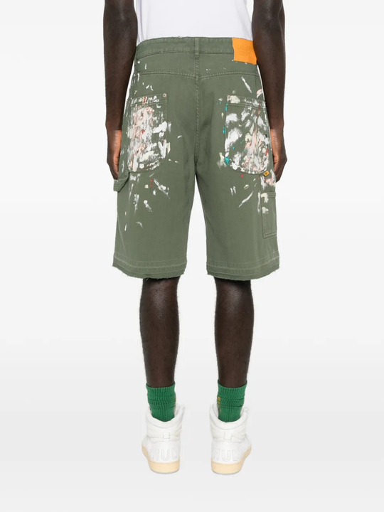 Green shorts worn by a person, showing the shorts fit