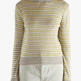 Yellow knitwear worn by a person, showing the knitwear fit